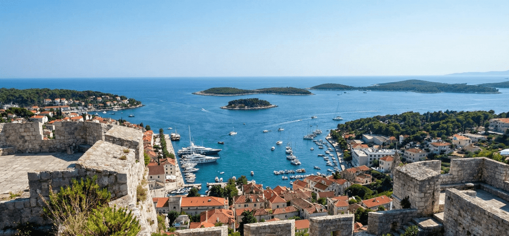 Split Itinerary 2026: How to Spend 1, 2 or 3 Days in Split, Croatia 8 Hvar Old Town harbour with fishing boats and the 16th-century fortress on the hill above, Hvar island, Croatia